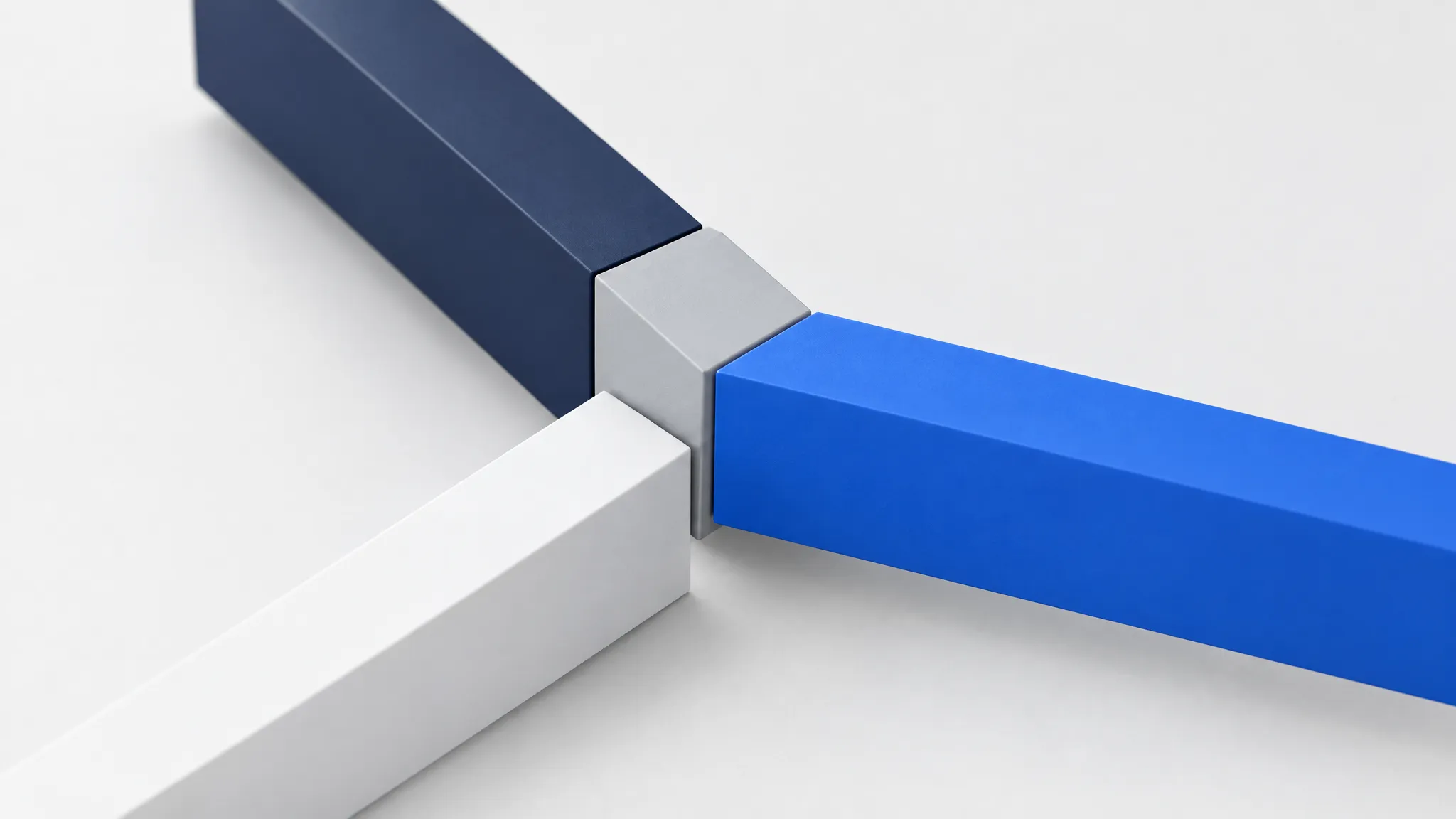 Three different colored building blocks converging to fit the same connection socket