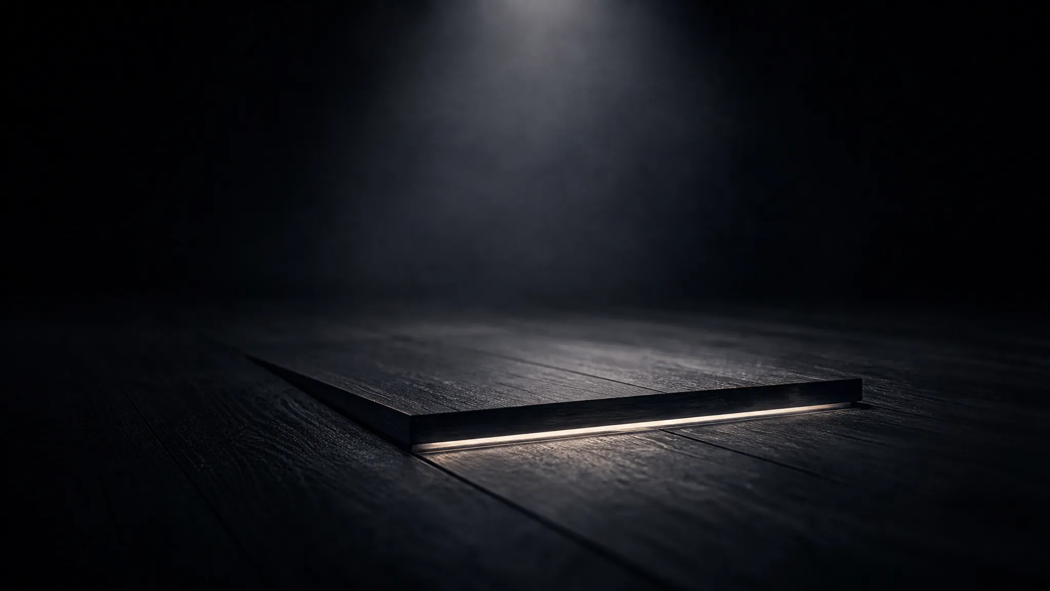 A hidden trapdoor slightly ajar in a floor with light escaping, representing concealed execution